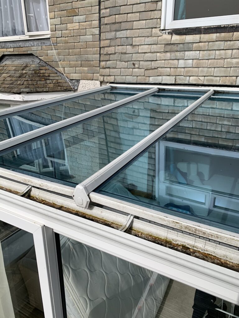 conservatory roof clean before with seagull mess