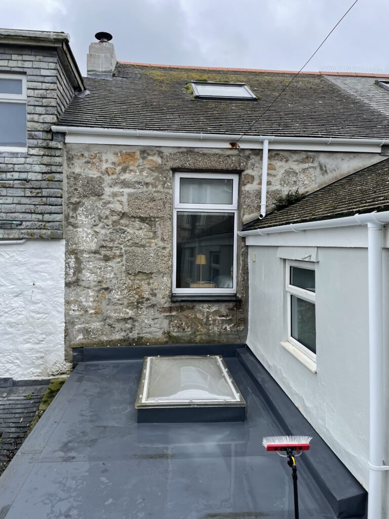 soft washing and moss clearing on top of a roof (after)