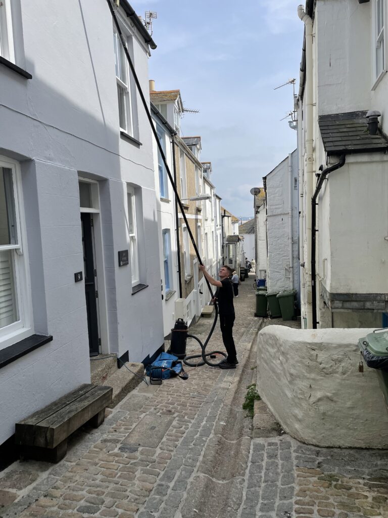 Gutter clearing down an alley way