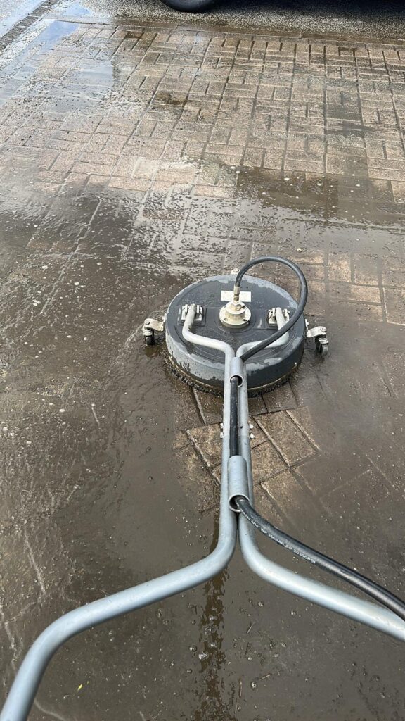 Pressure washing a very dirty driveway with a flat surface cleaner