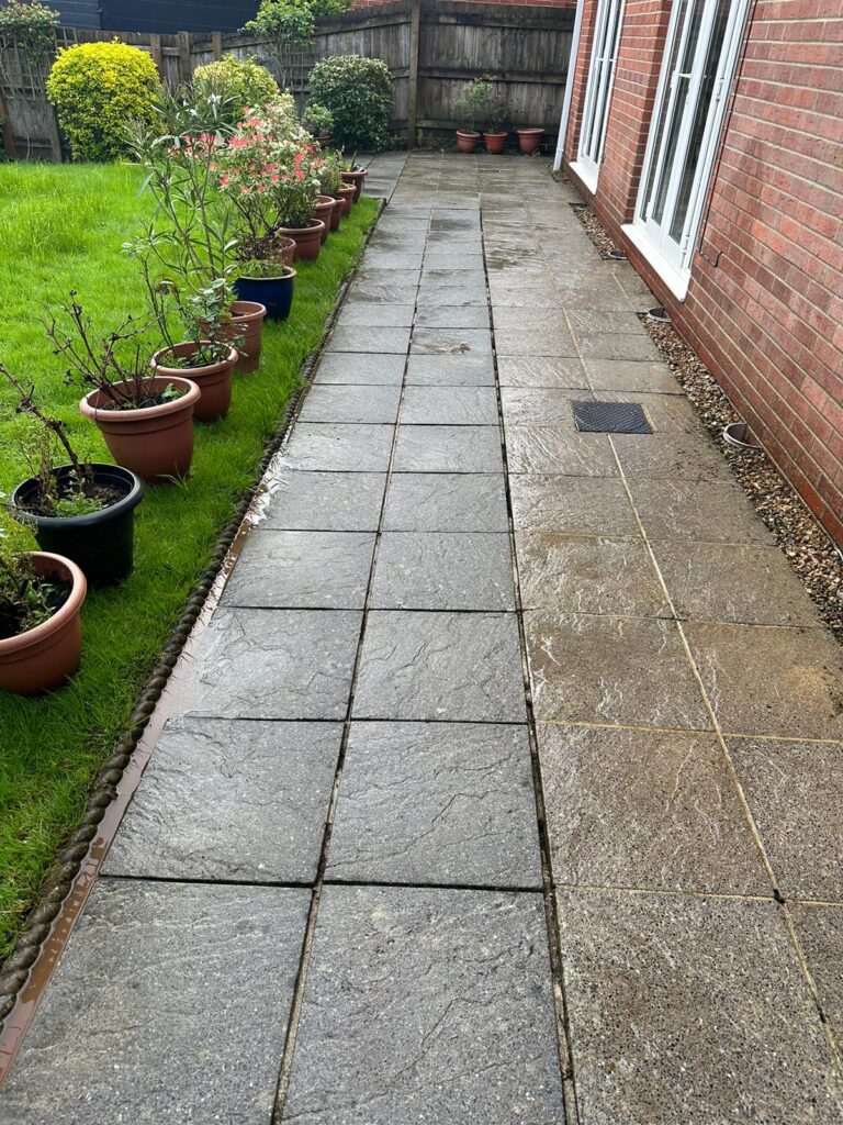 Half the patio cleaned. Before and after comparison